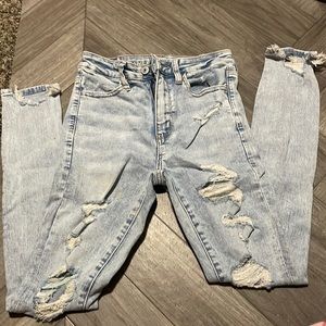 it does also have a light blue stain form a marker on the rip on the left leg.